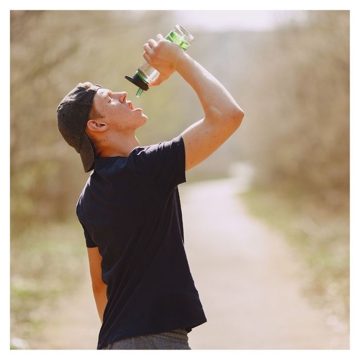 man drinking water