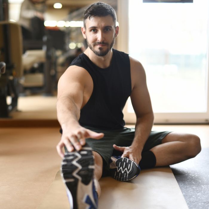 Man stretching his hamstring