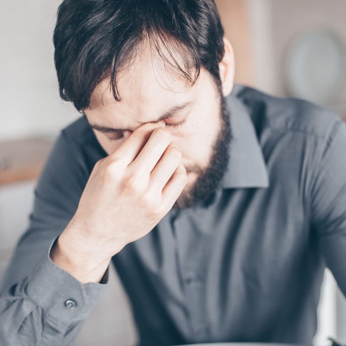 Man holding his head