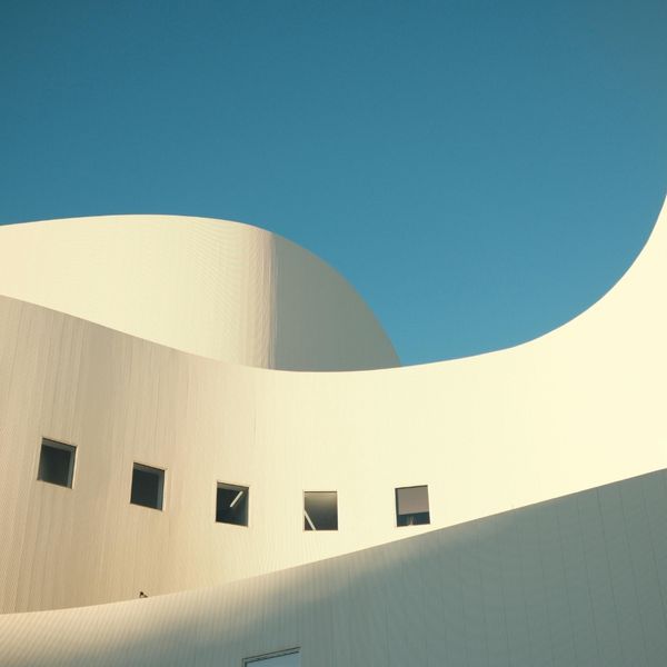 White Curving Building White Curving Building