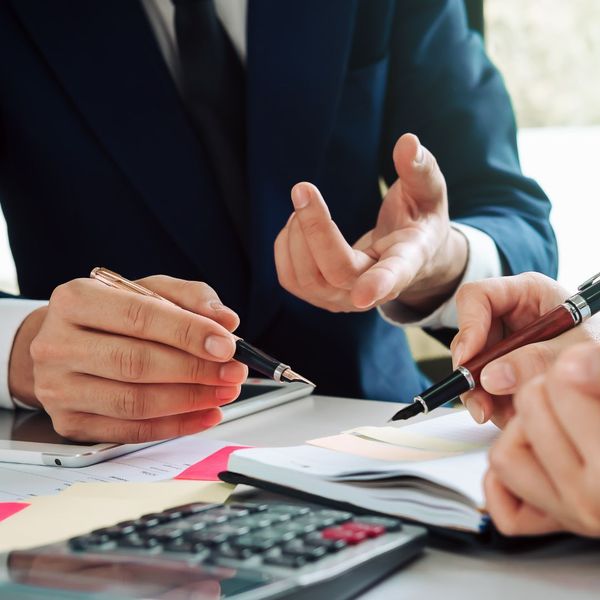 people working on financial and investment planning