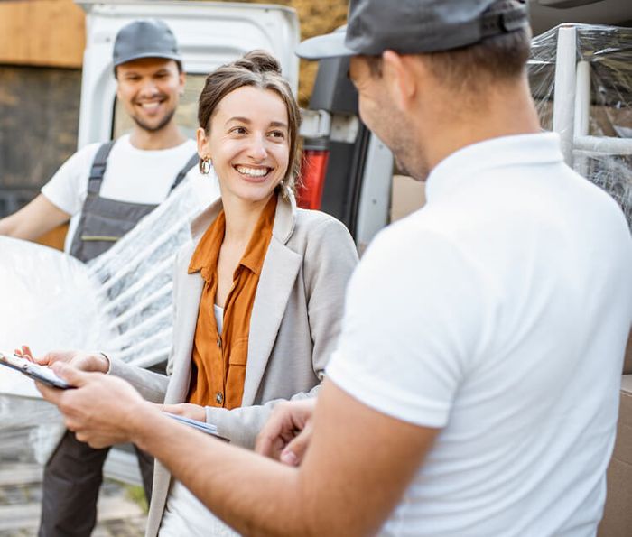 woman talking to moving company