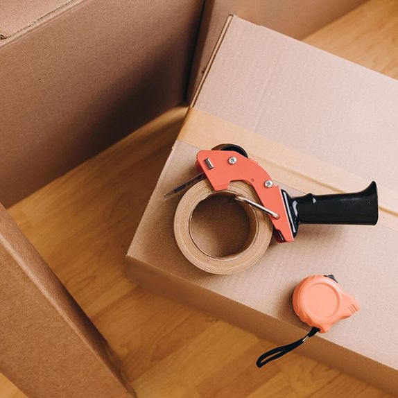 packing tools on top of moving boxes