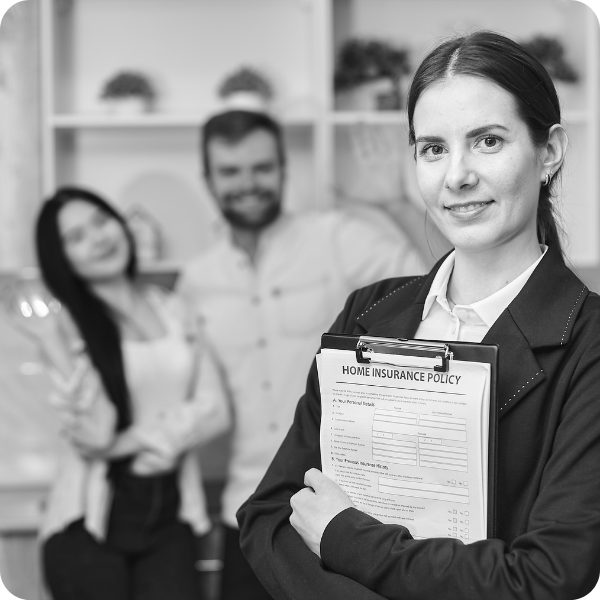 couple meeting with an agent for home insurance