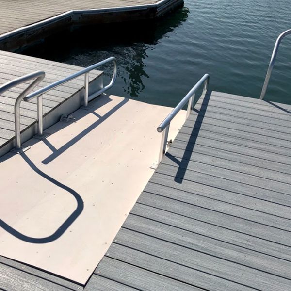 A custom boat dock with a custom ramp feature.