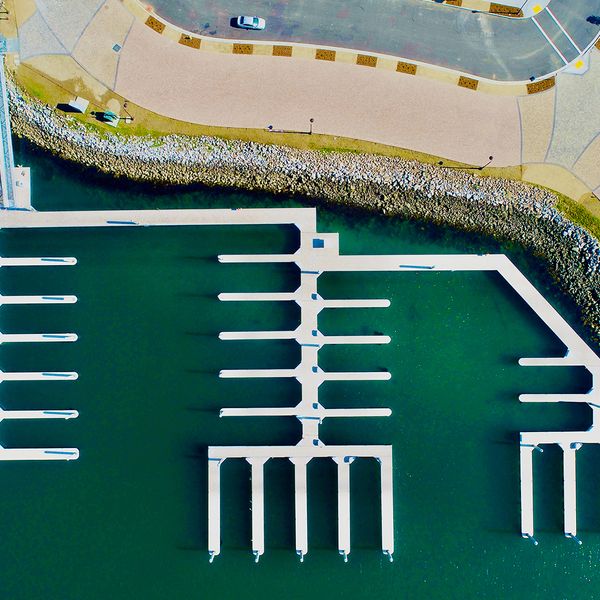 Aerial few of a large, custom boat dock. 