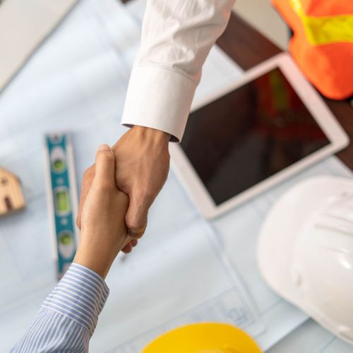 worker and client shaking hands