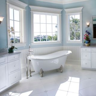 A bathtub in a bathroom 