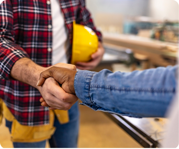 image of a contractor and client handshake