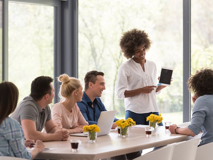 Image of an office meeting, preparing for the federal review.