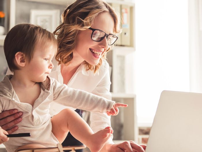  Image of mom and infant attending an online program.