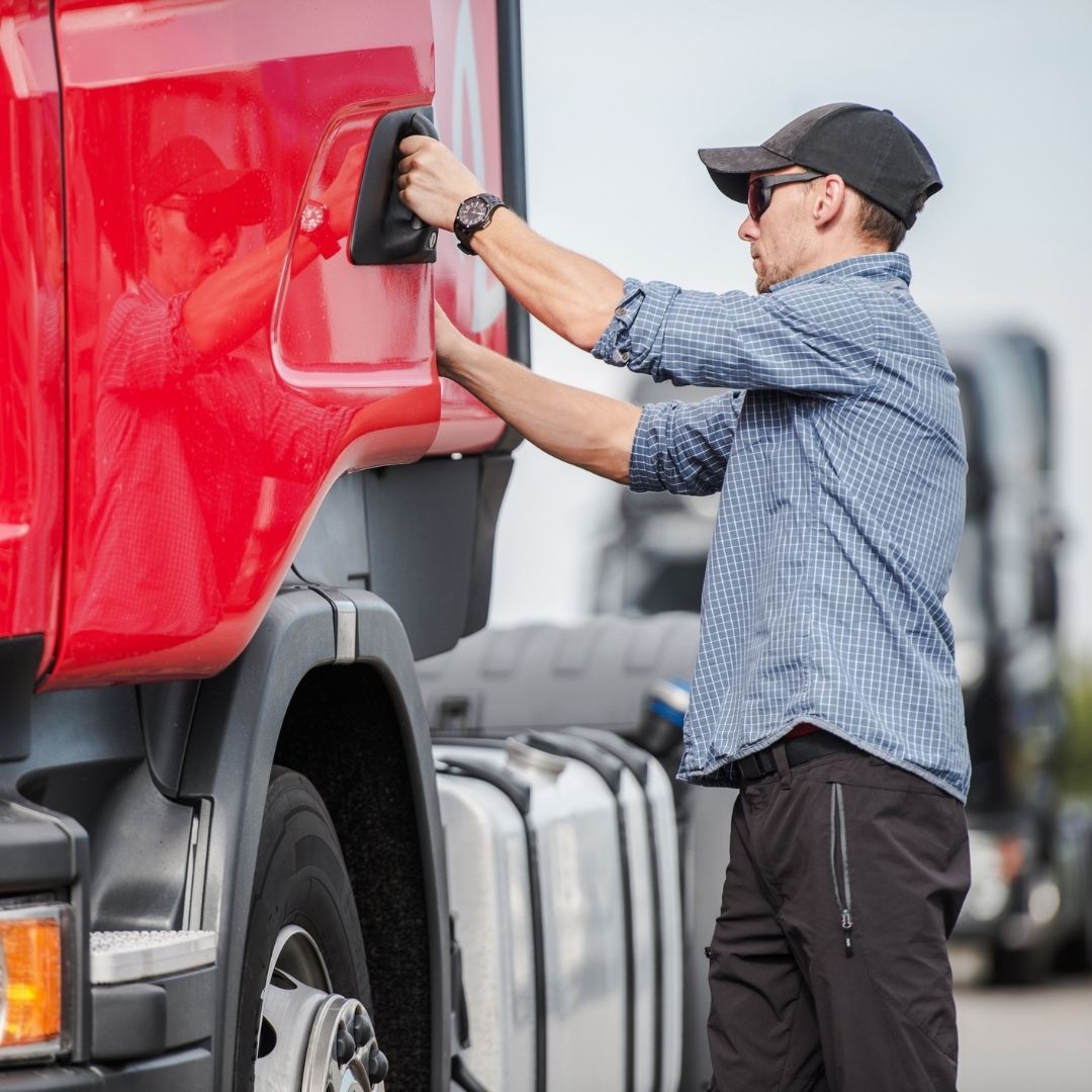 driver opening door of red semi truck driver opening door of red semi truck