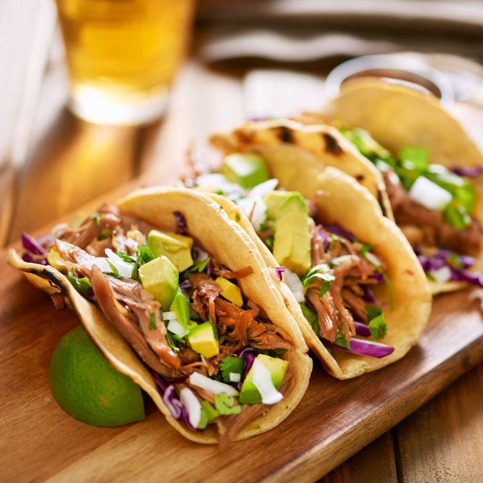 fresh tacos with lime and a beer 