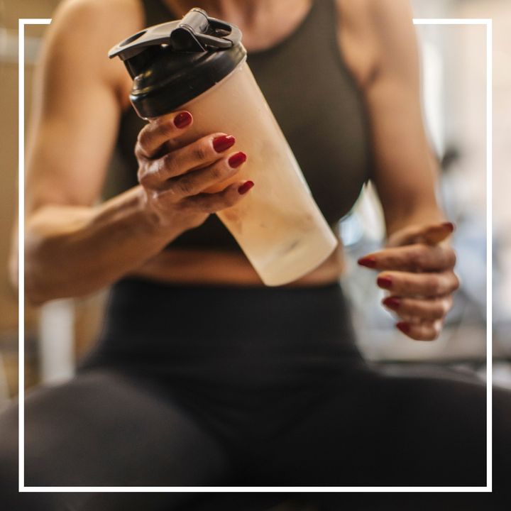 woman shaking pre-workout