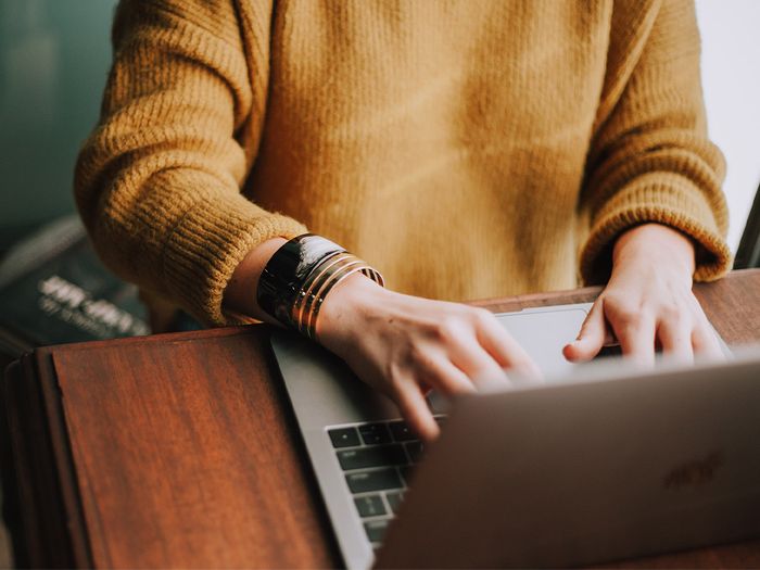 Woman searching on lap top