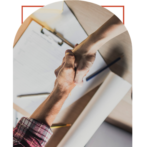 homeowner shaking hands with a contractor