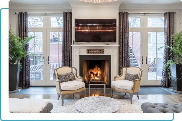 a living room with a fire place Home.jpg