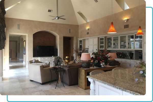 a living room with a vaulted ceiling Interior Remodel (2).jpg