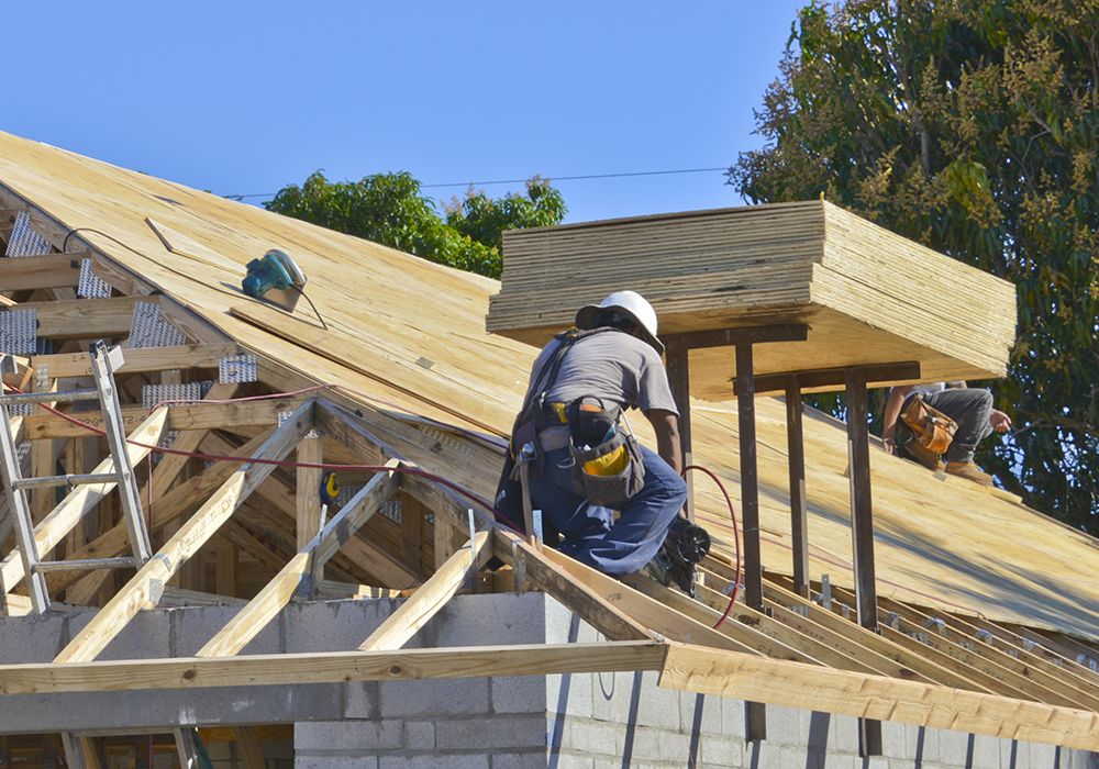 Image or roofers building a roof