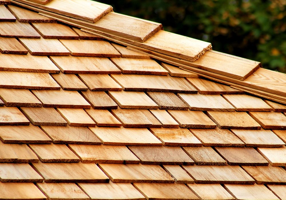 Image of a roof with wooden shingles