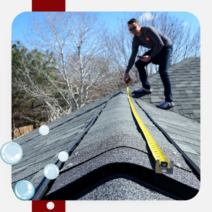 a man measuring an asphalt roof Cumming.jpg