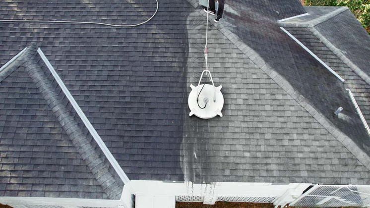 aerial view of roof being cleaned