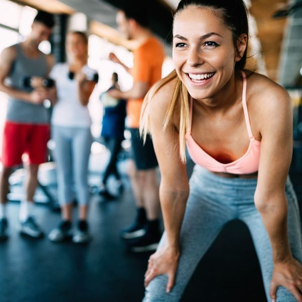 woman smiling at gym
