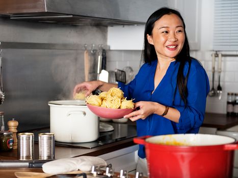 Image of a woman cooking Japanese food