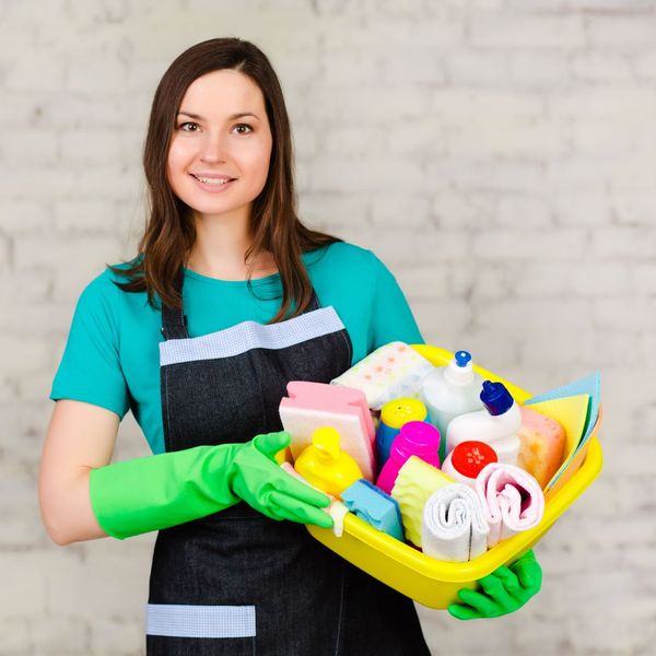 woman with cleaning supplies