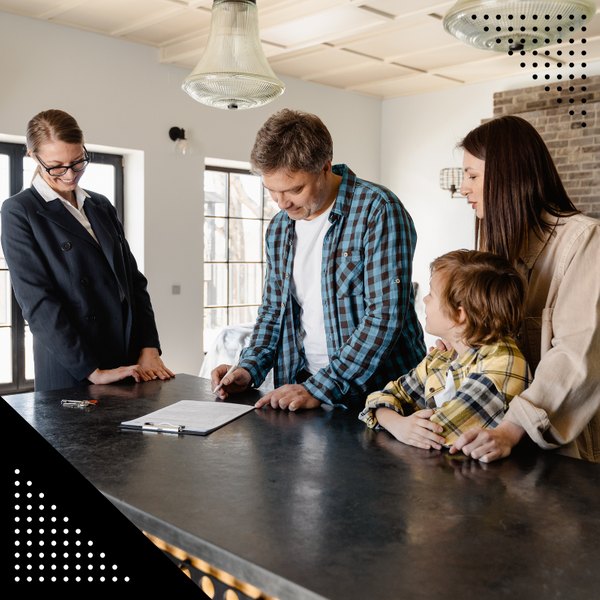 real estate agent signing papers