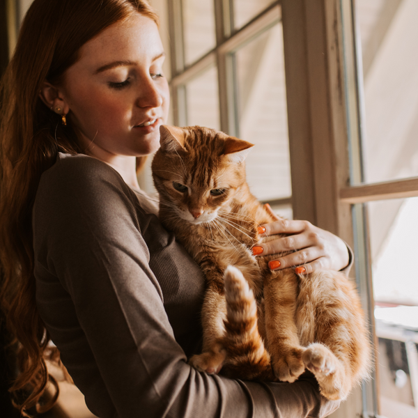 Woman holding cat