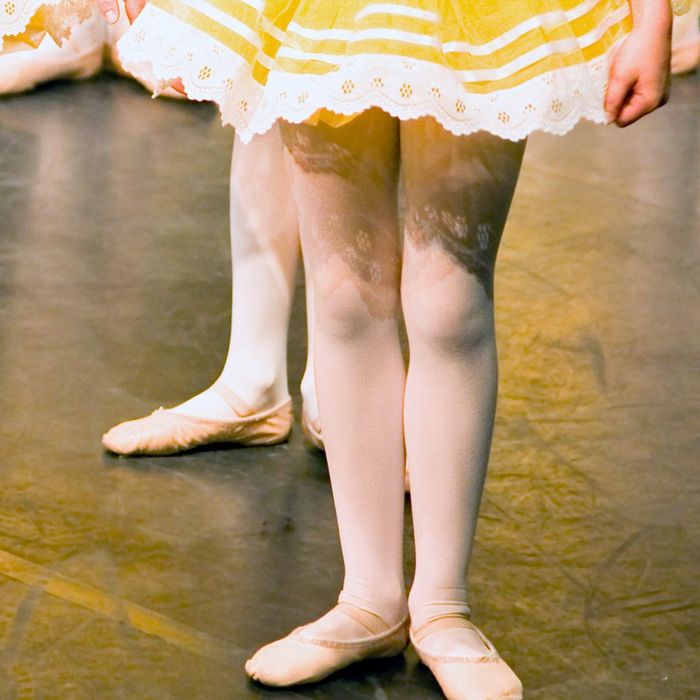 children wearing dance shoes