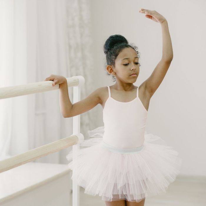 a child practicing ballet