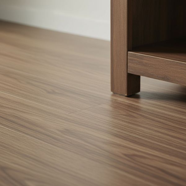 Close-up on a wooden furniture leg placed correctly on manufactured home flooring
