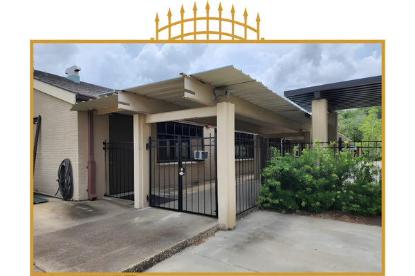 Wrought iron gate and fence. Wrought iron gate and fence.