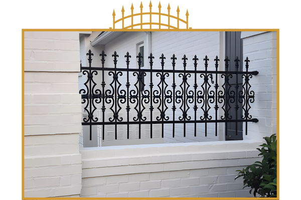 Wrought iron gate and fence. Wrought iron gate and fence.