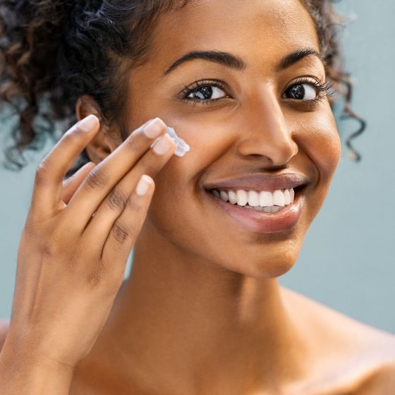 Woman Applying lotion