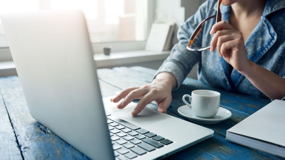 person on computer