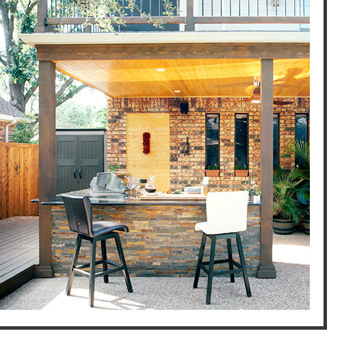 An outdoor bar area with stools