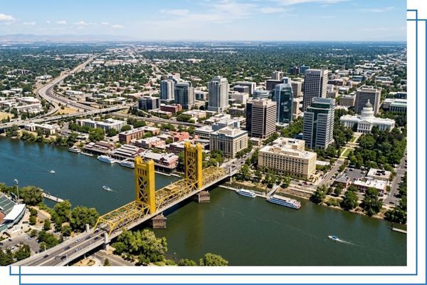 Aerial view of the Sacramento city skyline and Tower Bridge during daytime