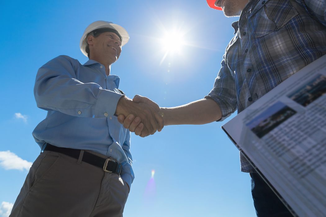 men shaking hands