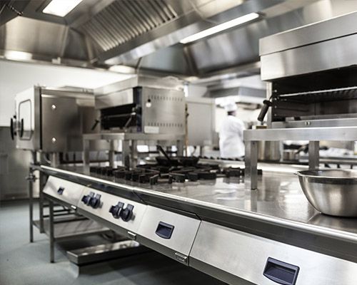 a kitchen with stainless steel appliances