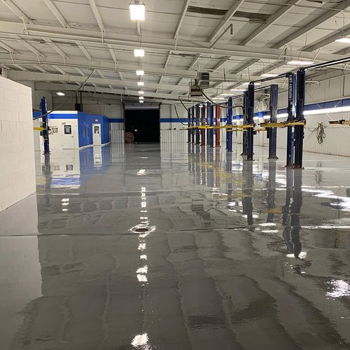 epoxied floor with car lifts