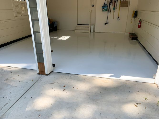 a garage with white floor