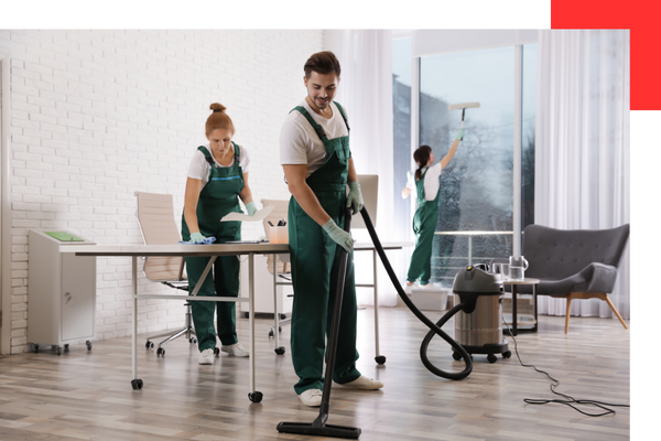 Janitorial team cleaning office space