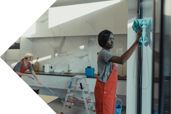 Janitorial workers cleaning office building