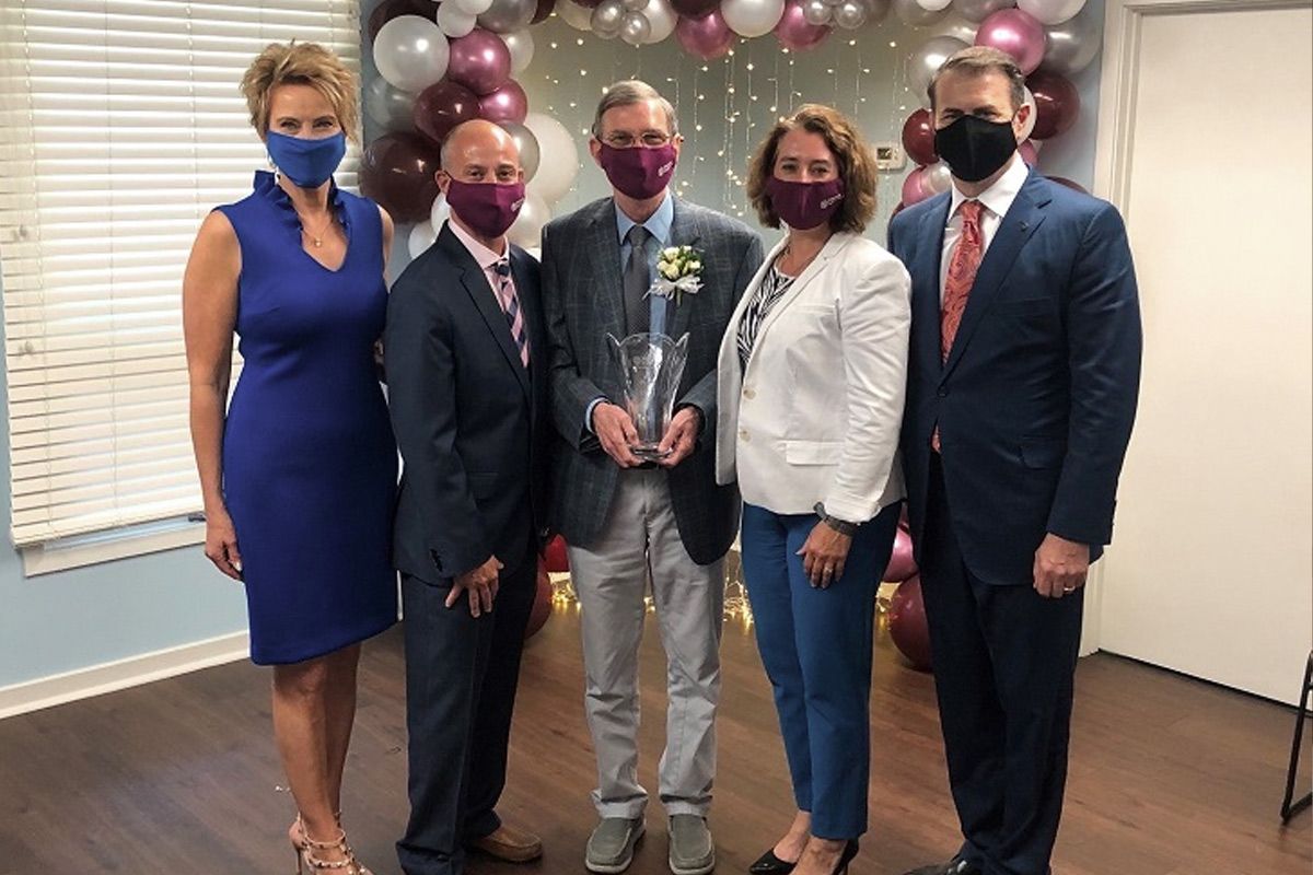 Celebrating the 2021 Home Instead North American CAREGiver of the Year in Charleston, S.C., are Lori Hogan, Co-Founder, Home Instead, Shannon Carithers, franchise owner, Home Instead of Charleston, Bill Glover, 2021 Home Instead North American CAREGiver of