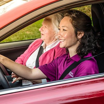 caregiver giving car rides