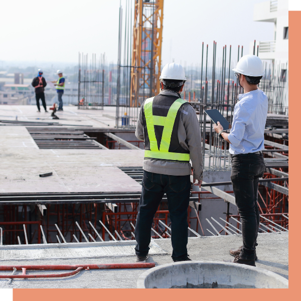 Workers overseeing a construction site