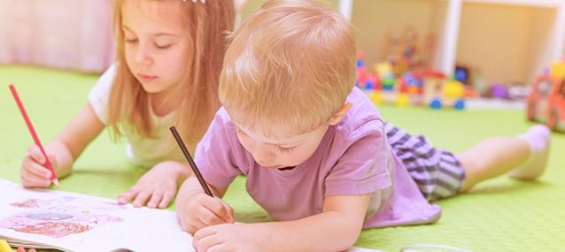 two children working on schoolwork